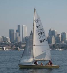 Parker and Ryley out on G'Pa Mark's sailboat with Greg